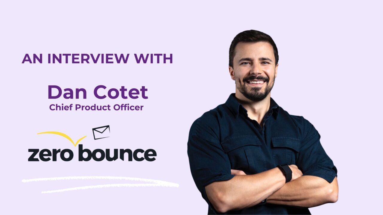 ZeroBounce Chief Product Officer Dan Cotet stands crossed arms on a lavendar background with the ZeroBounce logo depicted.