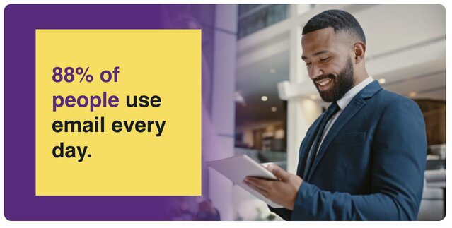 Bearded man looks at laptop considering that 88% of people use email everyday.